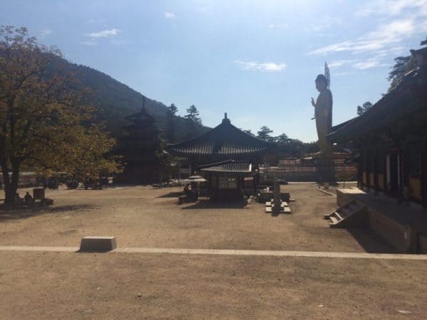 A notable Korean building featuring a central statue that blends art and architecture