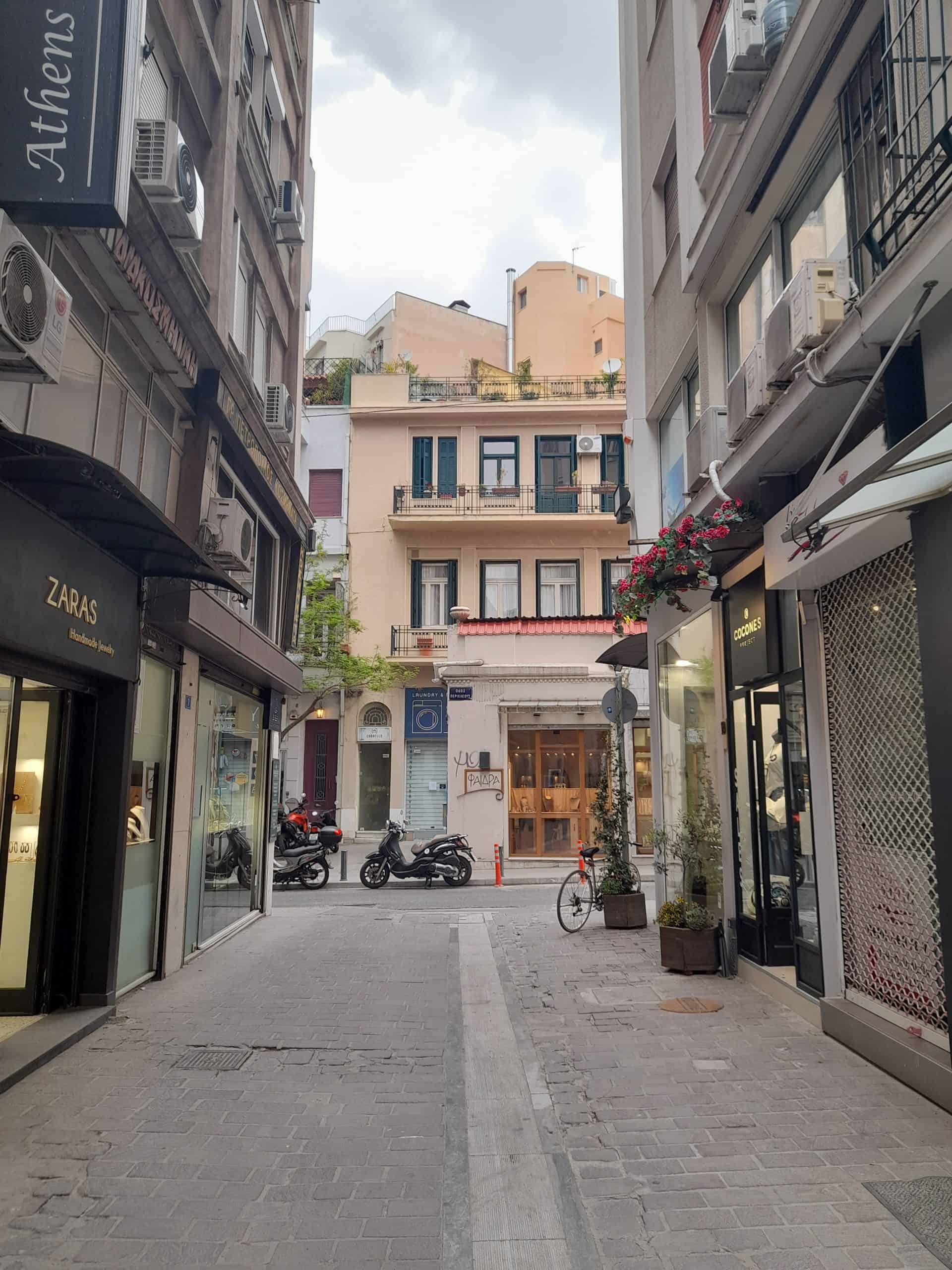 A street scene featuring a bicycle parked centrally