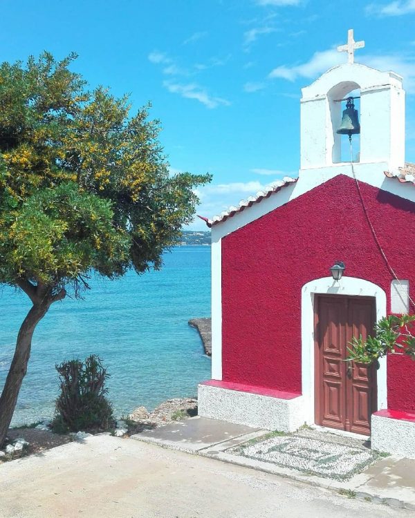 A view of a church beside a sea