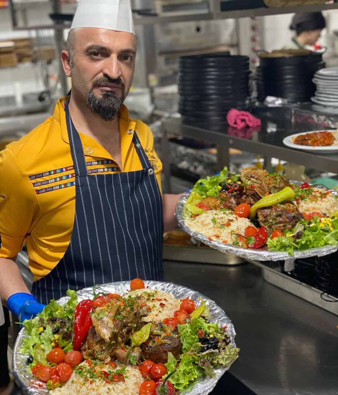 Man serving two turkish dish