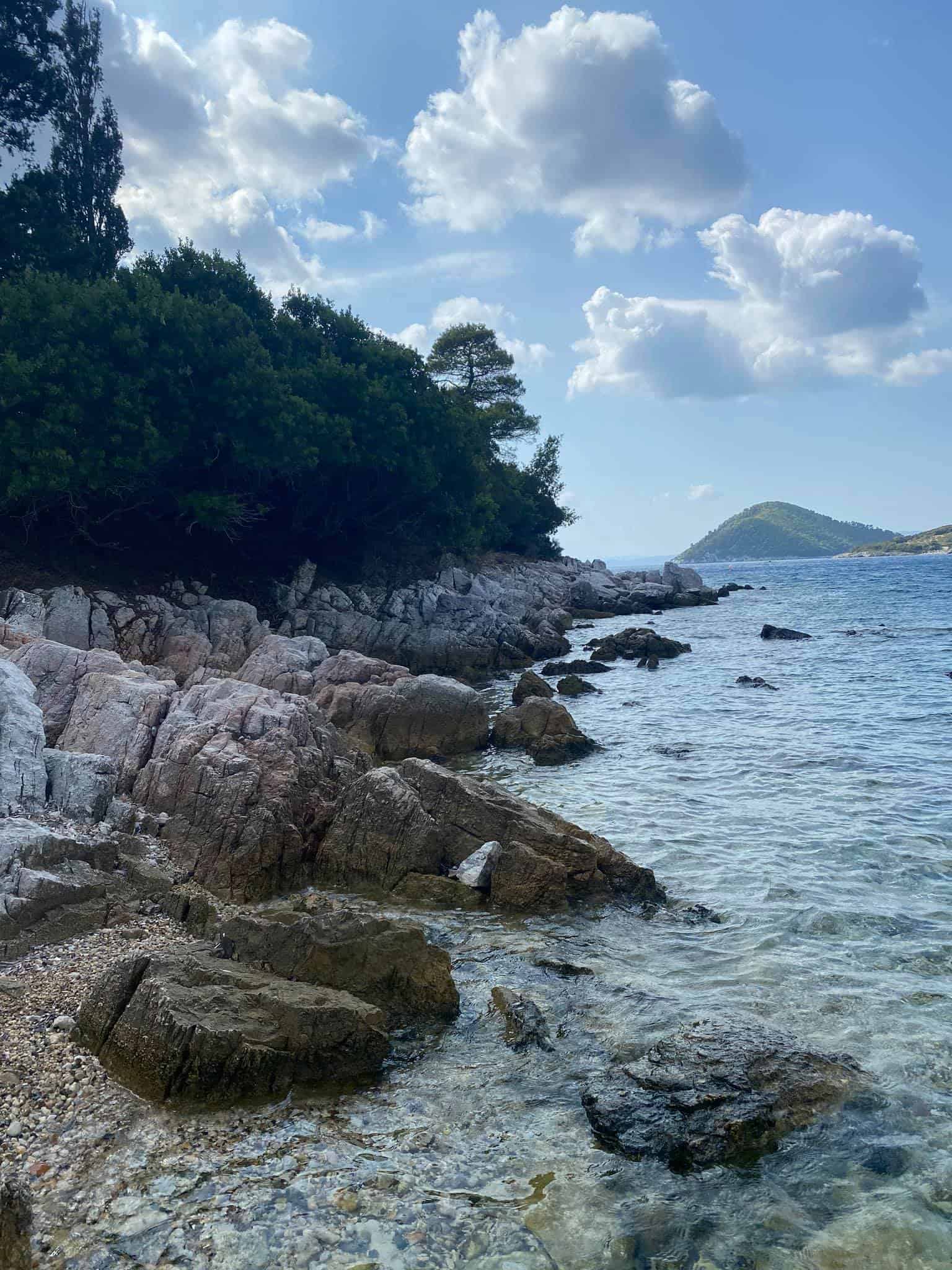 A serene view of the beach at Panormos beach, Skopelos