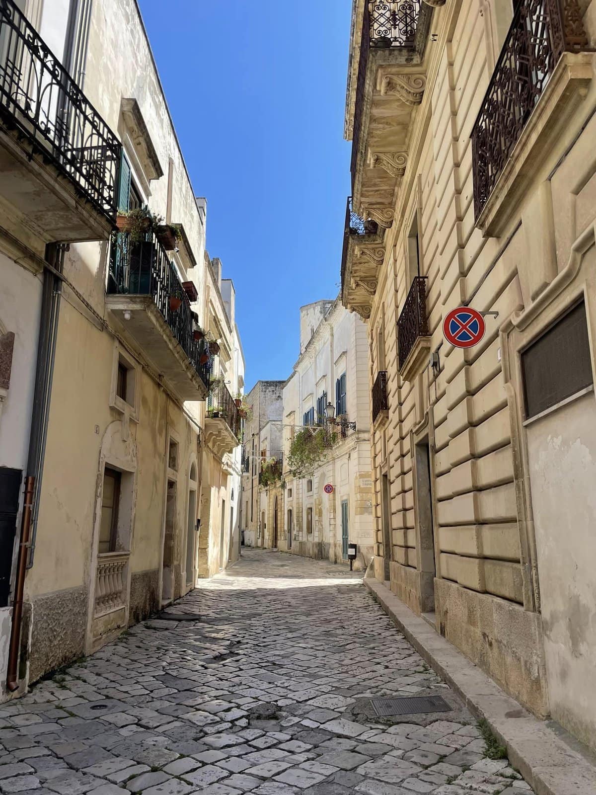 A narrow street in the historic old town of Puglia, Italy,