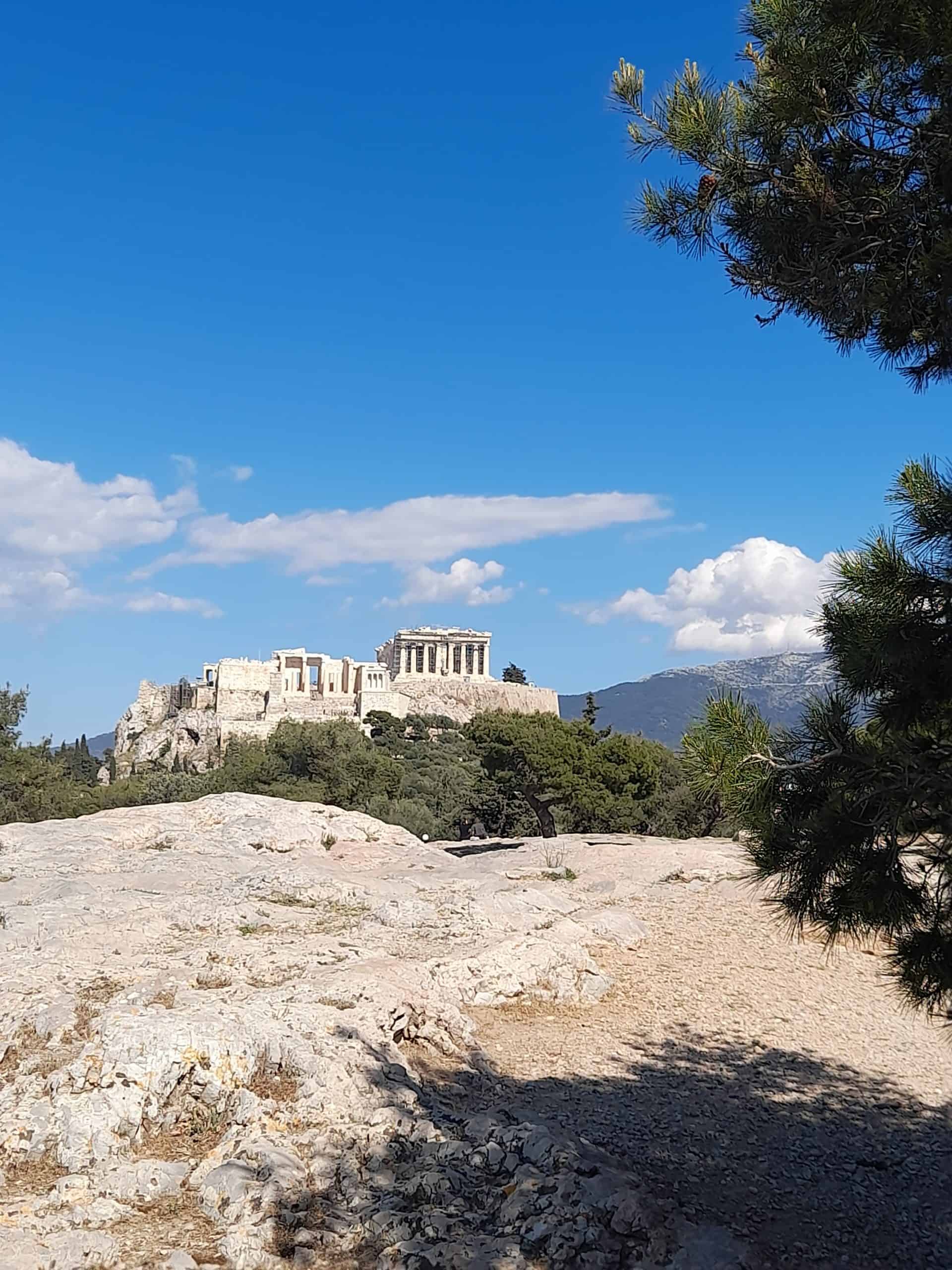 The Acropolis stands majestically atop a hill