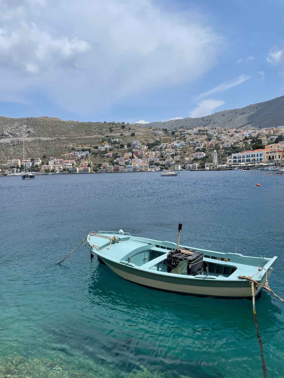 A small boat rests at a dock