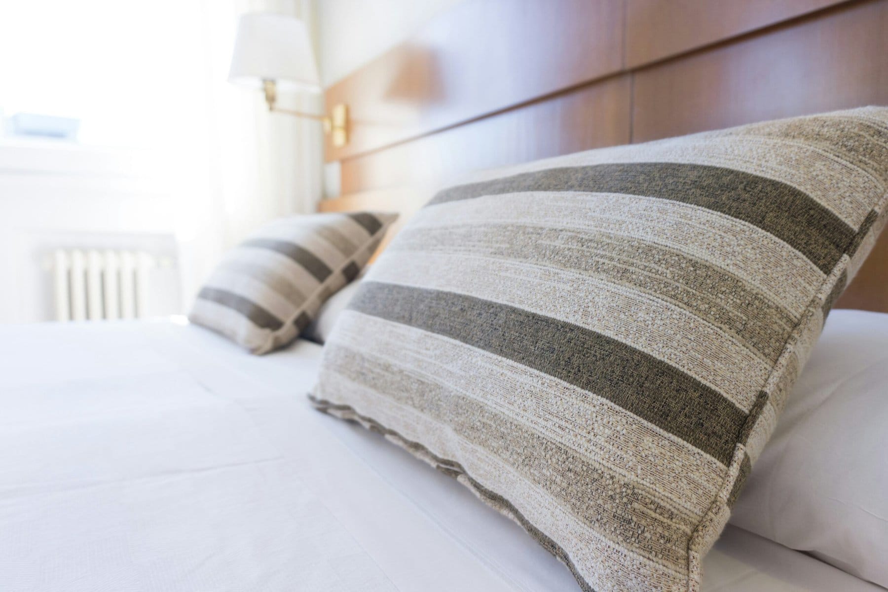 A close up image of pillows in the hotel room