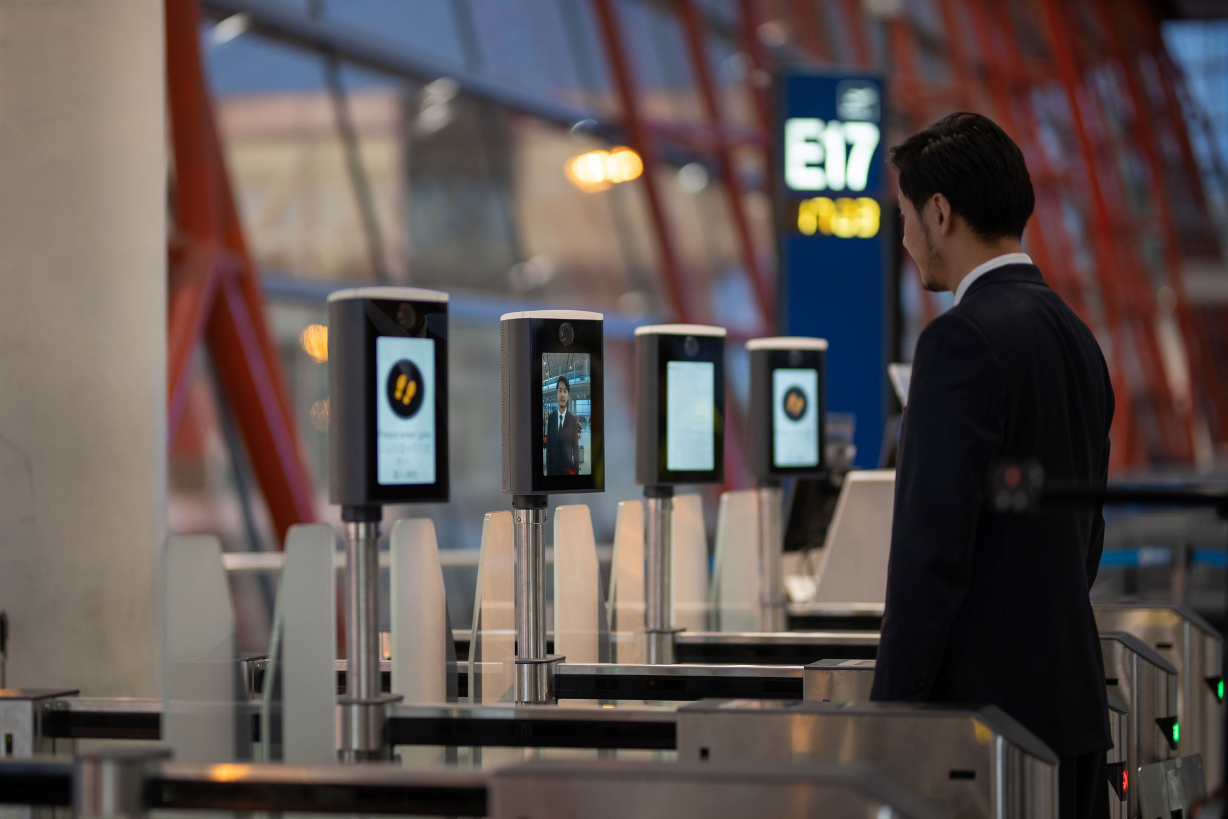 A traveller going through biometric checks in the airport going to Greece