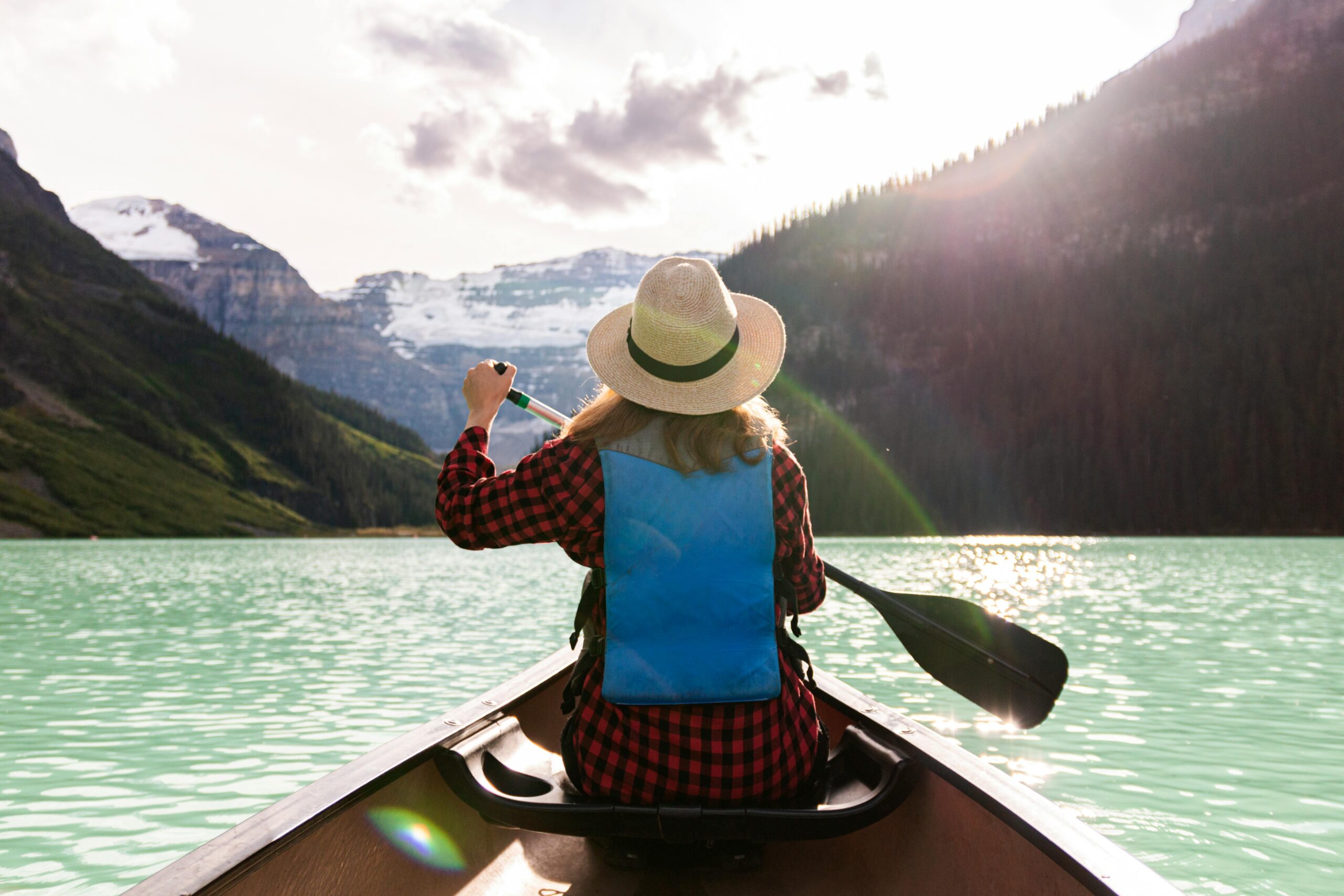 woman in a canoe paddling