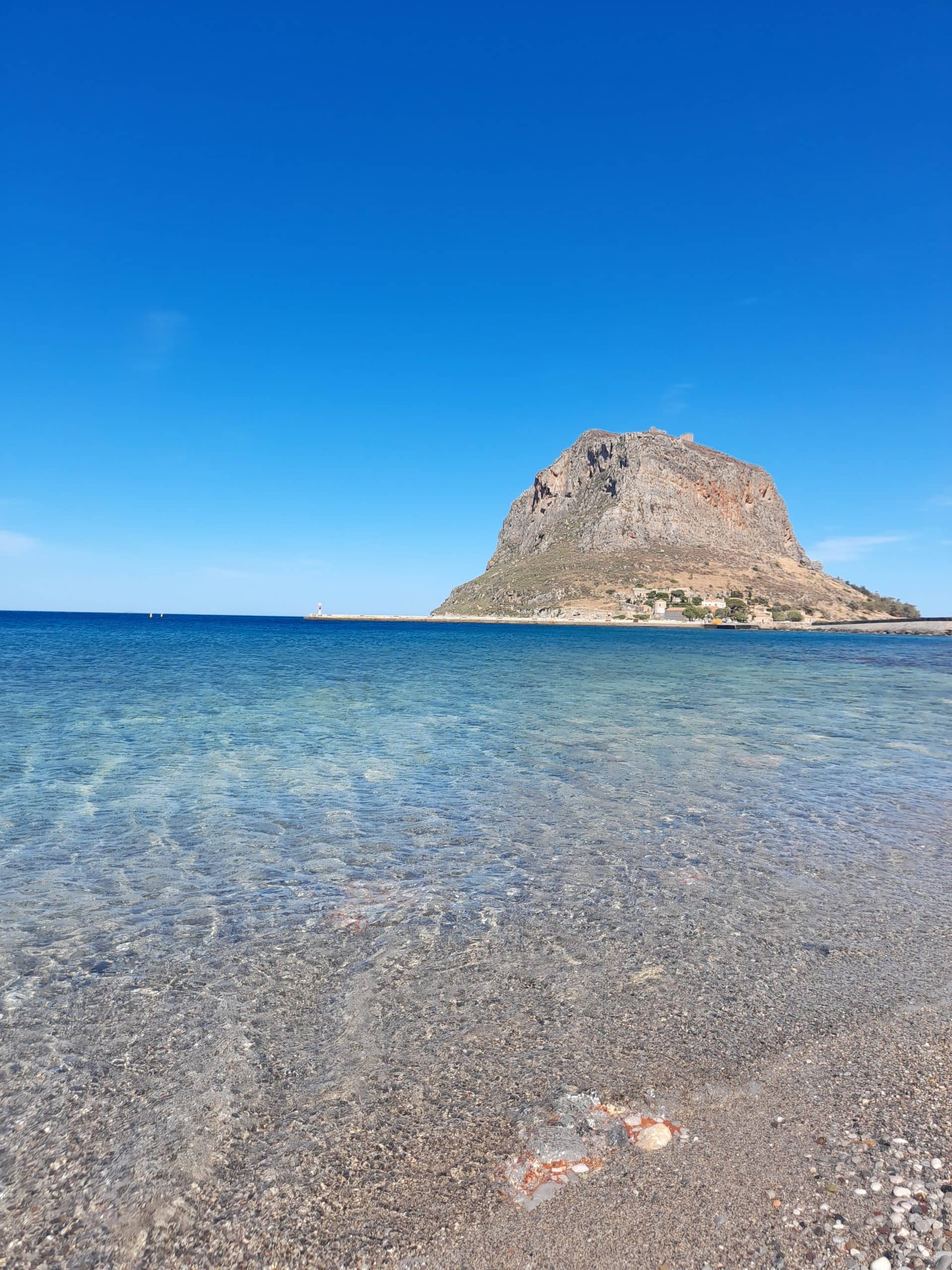 A serene beach with crystal-clear water