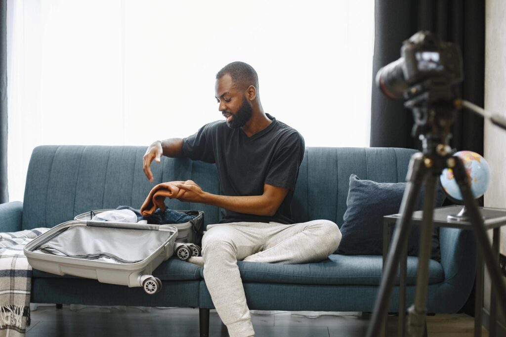 man packing his luggage