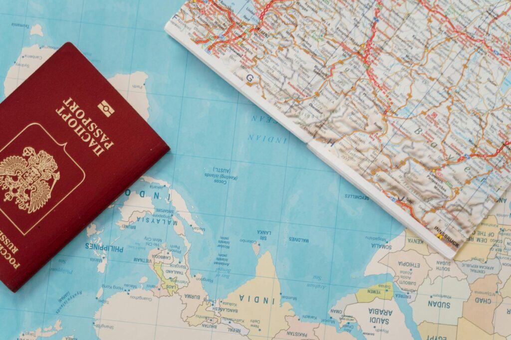 passport on top of map