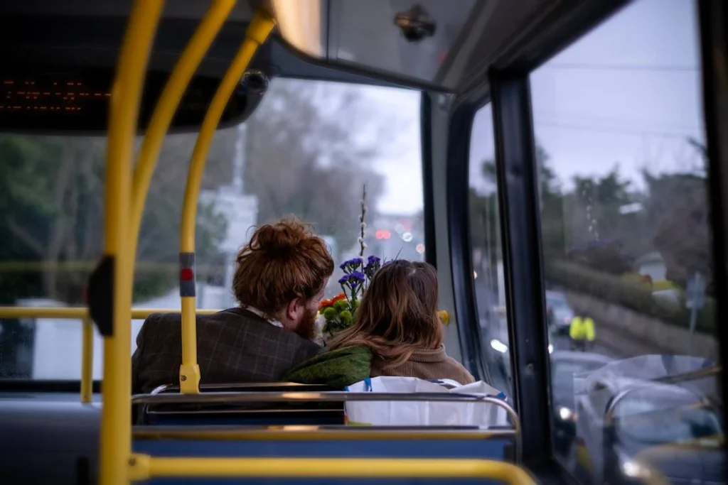 two women riding a bus