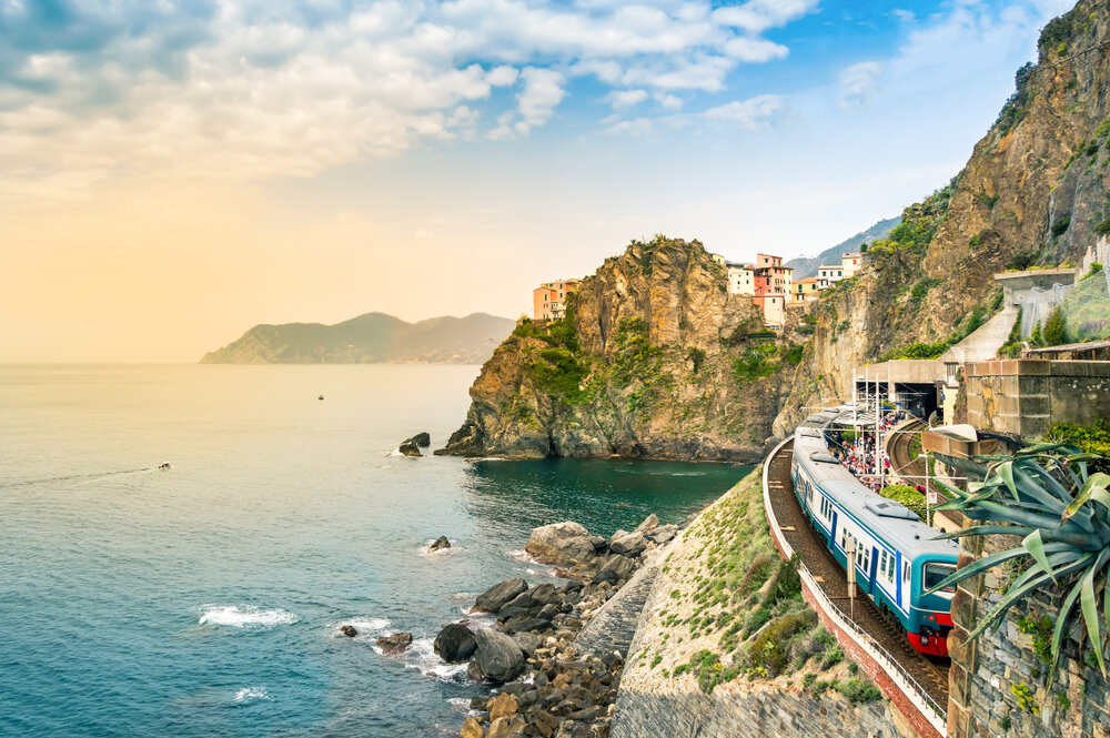 a train railway on a cliffside