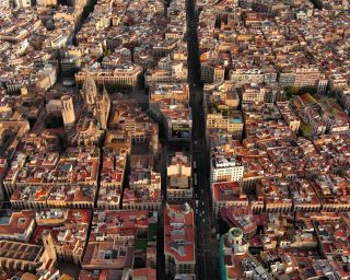 Aerial view of Barcelona skyline with Barcelona Cathedral and Gothic Quarter at sunrise