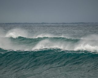 Massive rolling waves coming into Coogee Beach during a big storm in the pacific ocean