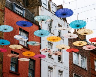 Umbrellas hanging over street in Chinatown in London