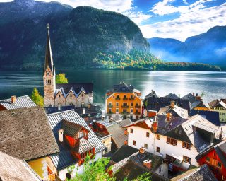 Views over roofs of the lake and Hallstatter and Hallstatt Lutheran Church, Austria